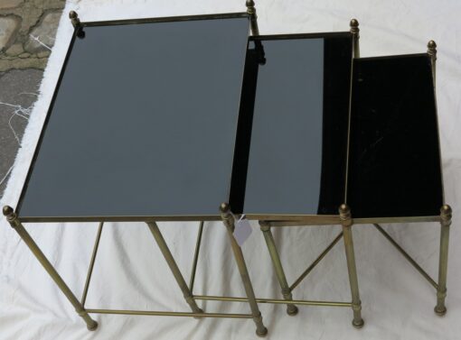1950/70 Series of 3 Nesting gilted bronze tables  top black opaline entretoise in X