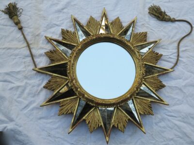 Miroir en étoile,bois doré et miroir oxydé