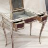 Coiffeuse de style Louis 15  ornée de miroirs églomisés