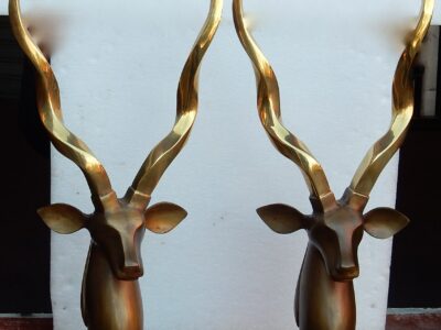 1970-1980 Pair of heads of antelopes bronze