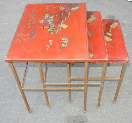 1950/70 'Series of 3 Ramsay House Style Nesting Tables in Gilded Iron Trays Red Chinese Lacquer Landscape Decor With Figures and Pagodas