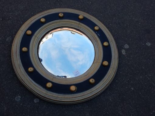 1950' convex mirror with its 12 convex golden buttons
